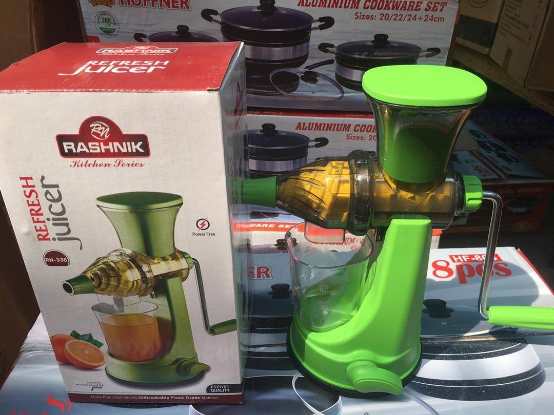 img_0646-2 MULTIFUNCTIONAL MANUAL FRUIT JUICER/EXTRACTOR(For juicing your fruit,vegetables and ice cream) - Image 1