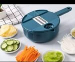 MANUAL VEGETABLE SHREDDER OR GRATER WITH BLADES AND SKIN PEELER