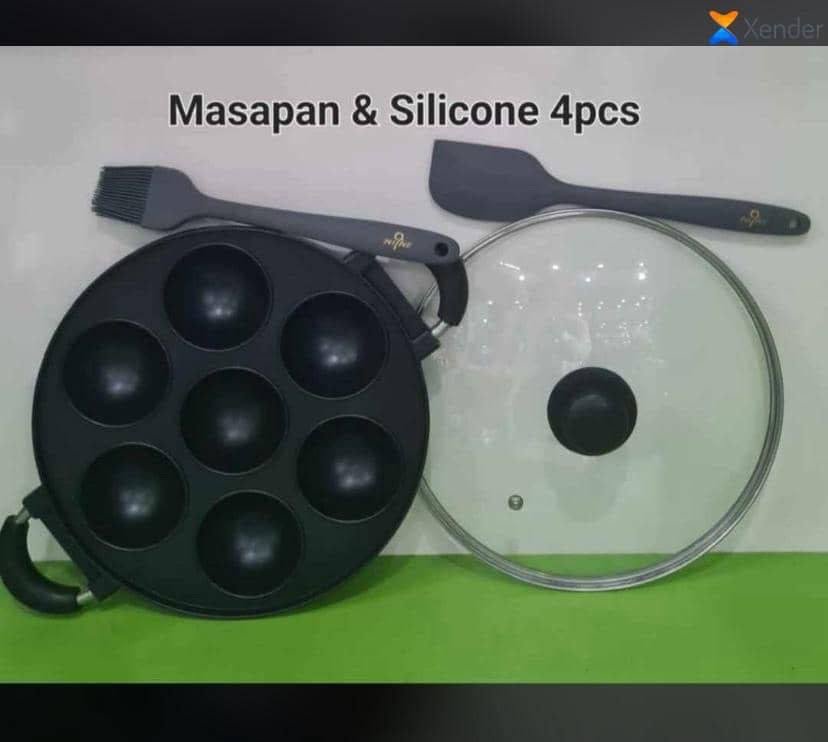 img_0689-2 7 HOLES ROUND SHAPE NON STICK MASA/BEAN CAKE PAN WITH GLASS LID/COVER AND 2 SILICON
MASA PAN,COVER&2SILICON(that’s what makes it 4pc o) - Image 1