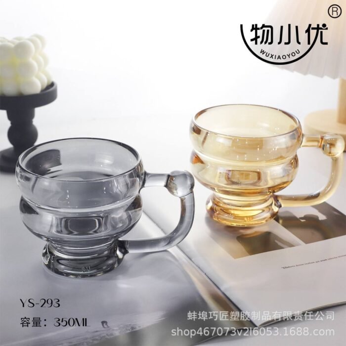(ON SALES) 350ML CLASSY QUALITY MILK,SMOOTHIE,COFFEE GLASS CUP WITH HANDLE Design 1 

Color we’ve seen so far is Gold and Black for now - Image 2