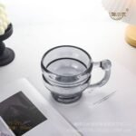 (ON SALES) 350ML CLASSY QUALITY MILK,SMOOTHIE,COFFEE GLASS CUP WITH HANDLE Design 1 

Color we’ve seen so far is Gold and Black for now - Image 4