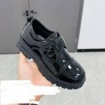 LIAM PATENT QUALITY BOYS SCHOOL/DRESSING SHOE
(IT RUNS 1 SIZE SMALL)