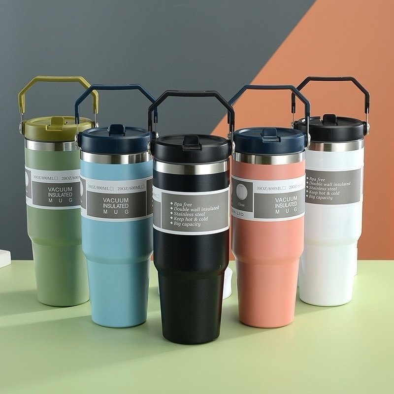 img_5863 INSULATED VACUUM STAINLESS STEEL TUMBLER CUP WITH HANDLE AND SUCKER(900ML) - Image 1